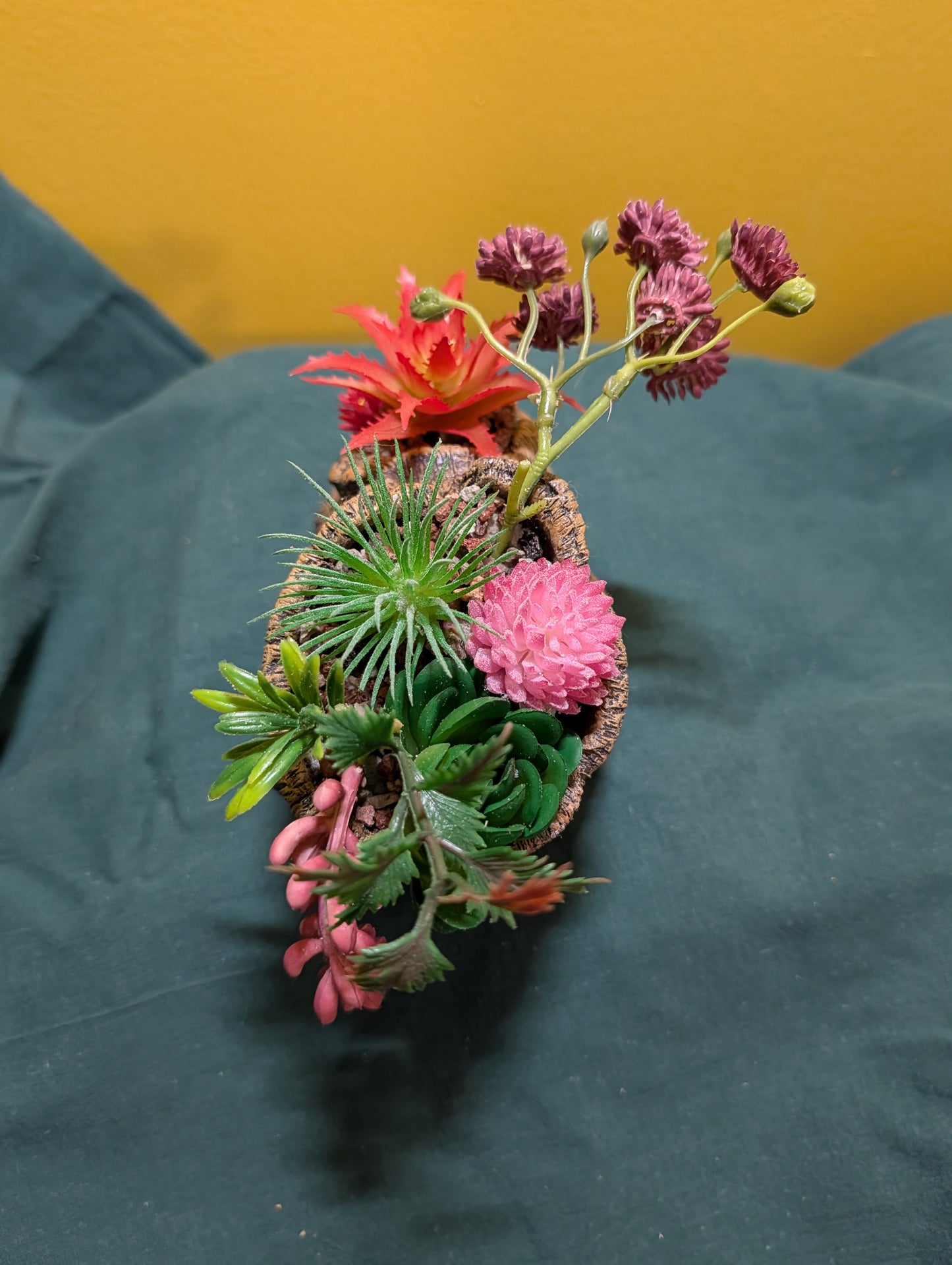 Log with Faux Plants